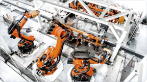 An automated production line with robotic arms.